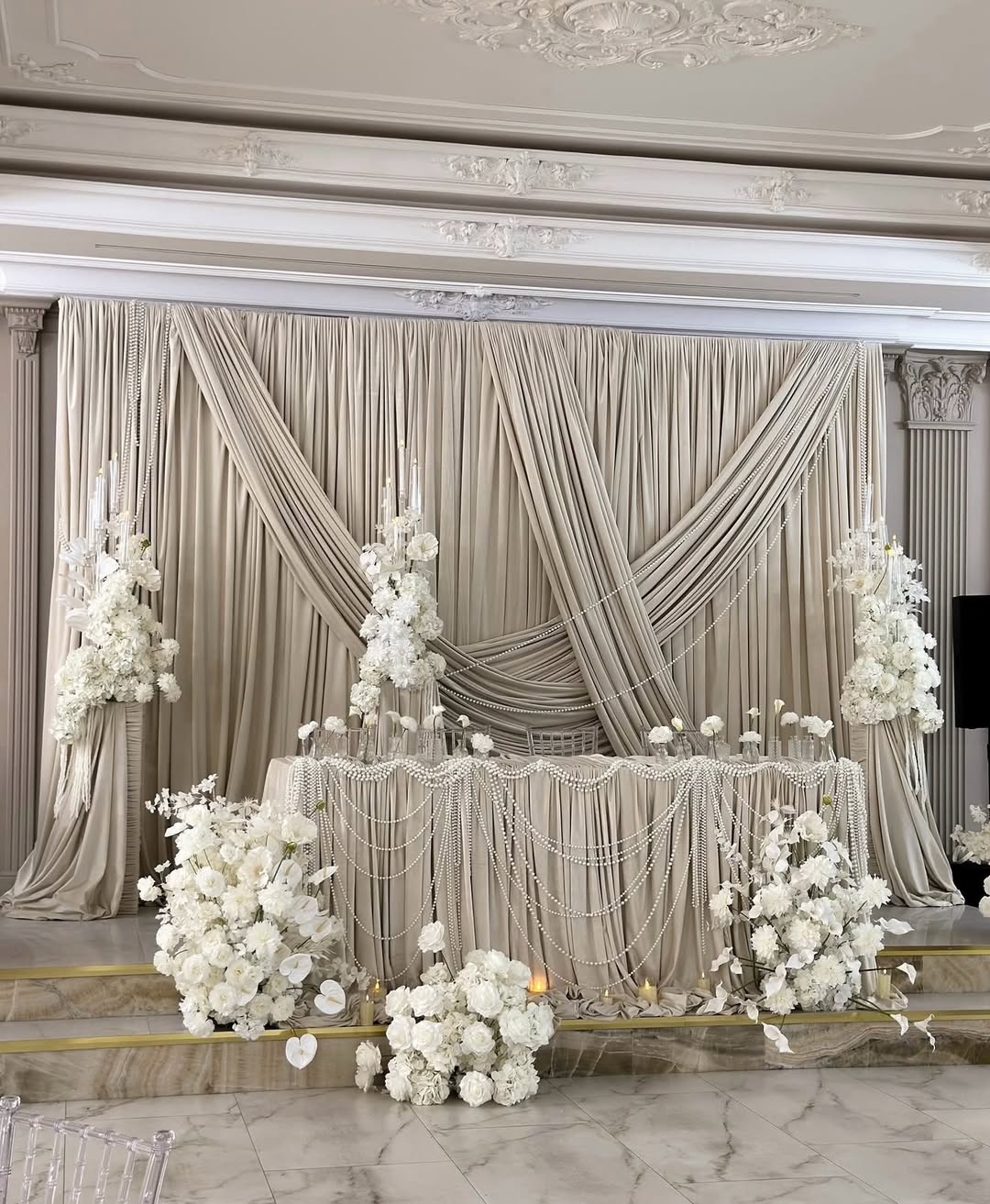White florals & elegant stands by Party Land